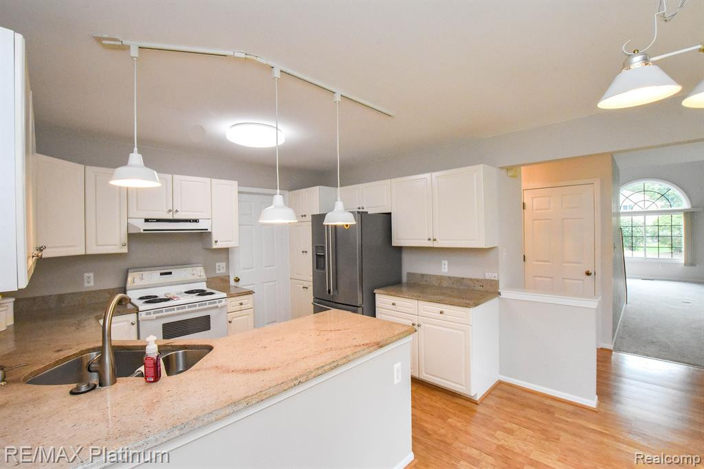1025 ELMWOOD Drive, Brighton, MI 48116 — Photo 18