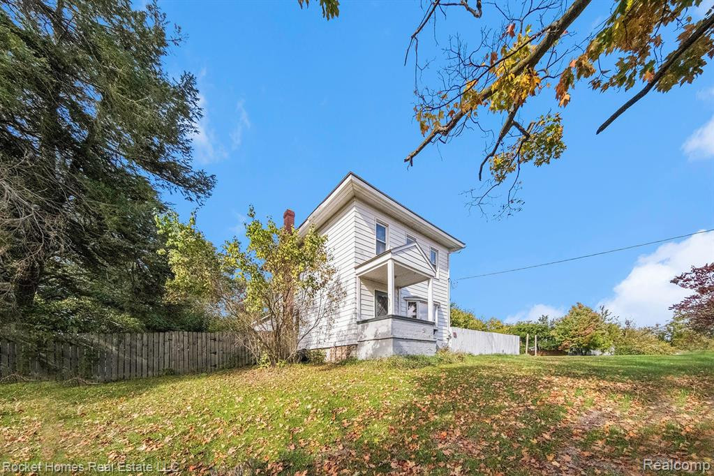 10870 Canandaigua Road, Clayton, MI 49235 — front exterior