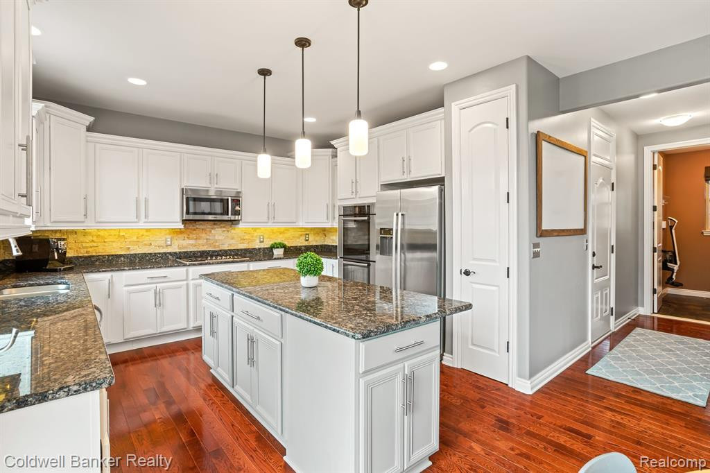 22996 FREMONT Drive N, South Lyon, MI 48178 — Photo 26