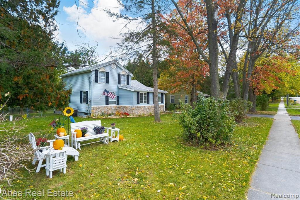7483 PONTIAC Street, Goodrich Vlg, MI — front exterior