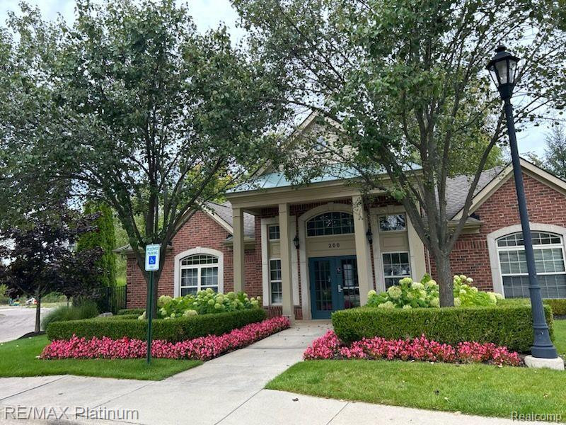 651 POINTE Drive, Walled Lake, MI 48390 — Photo 19