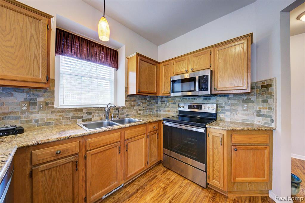 48579 Oak Bridge Drive, Canton, MI 48188 — Photo 8