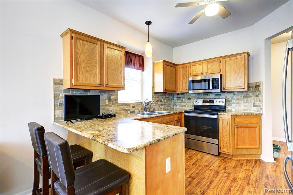 48579 Oak Bridge Drive, Canton, MI 48188 — Photo 13