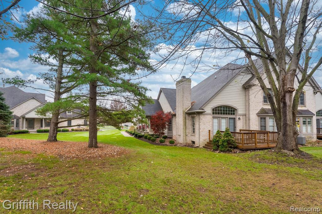 7563 WOODWIND Court, Brighton, MI 48116 — Photo 4