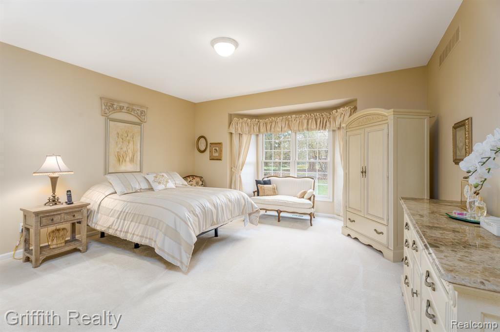 7563 WOODWIND Court, Brighton, MI 48116 — Photo 17