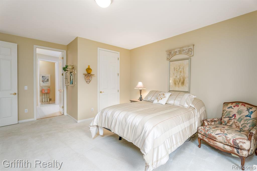 7563 WOODWIND Court, Brighton, MI 48116 — Photo 18