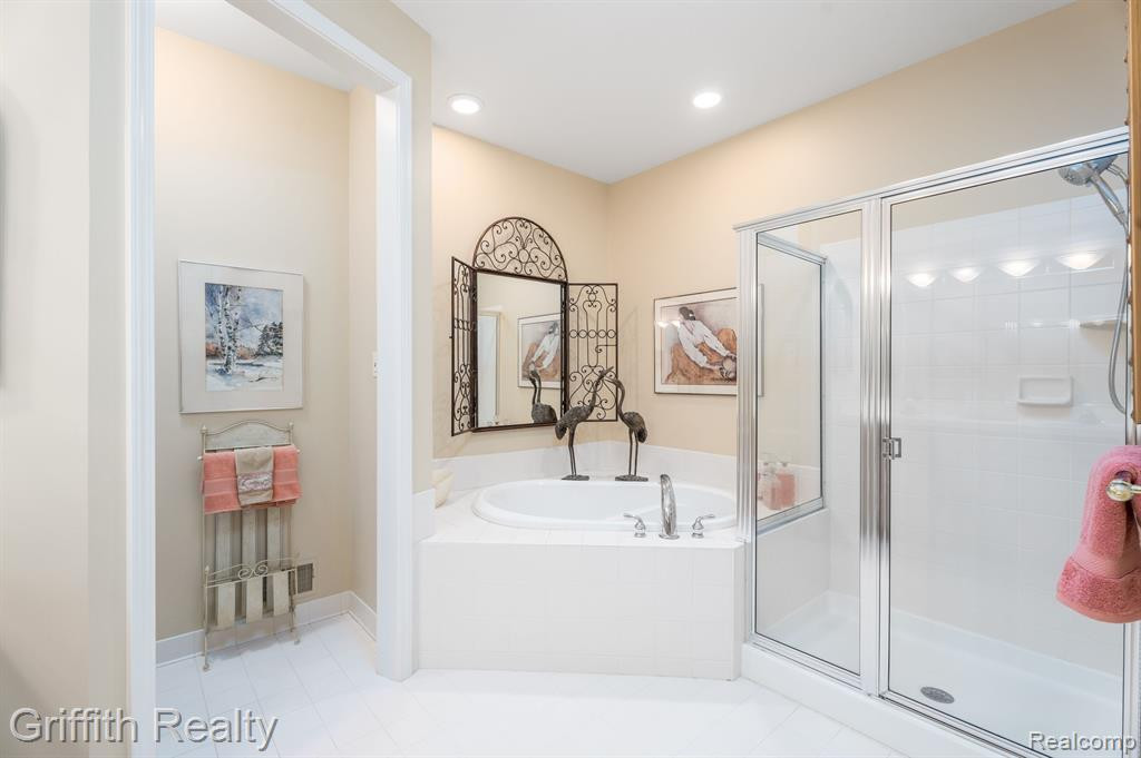 7563 WOODWIND Court, Brighton, MI 48116 — Photo 19