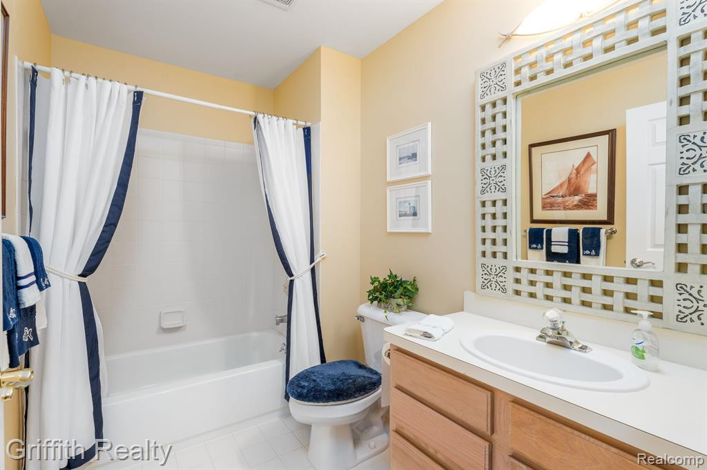 7563 WOODWIND Court, Brighton, MI 48116 — Photo 23