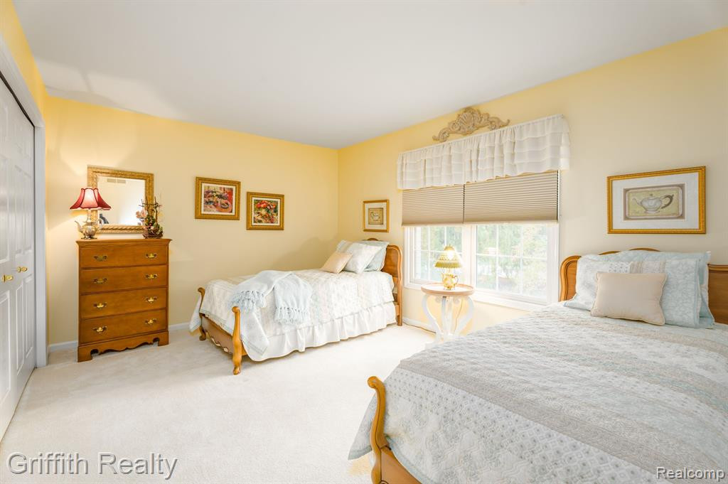 7563 WOODWIND Court, Brighton, MI 48116 — Photo 24