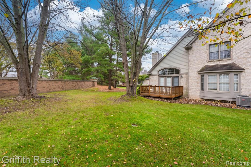 7563 WOODWIND Court, Brighton, MI 48116 — Photo 26