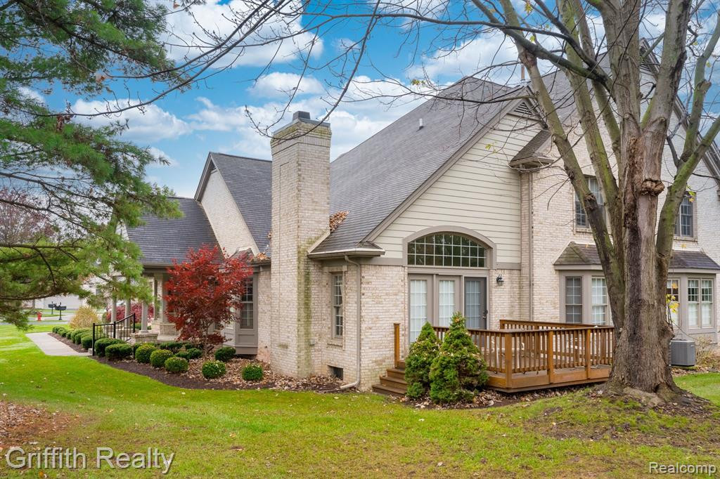 7563 WOODWIND Court, Brighton, MI 48116 — Photo 32