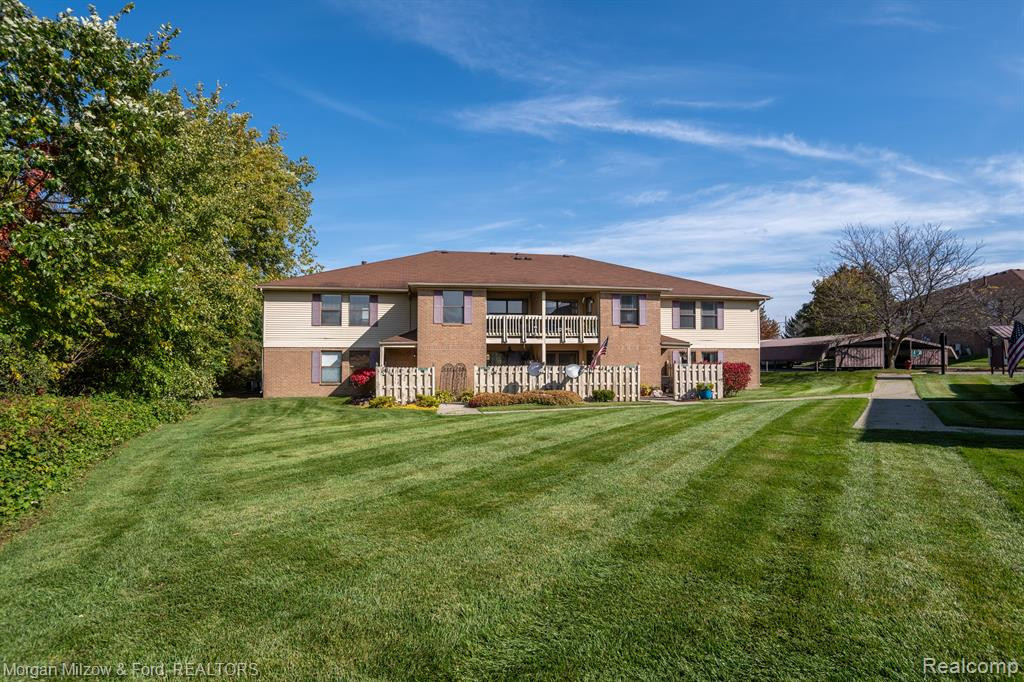 61196 GREENWOOD Drive, South Lyon, MI 48178 — front exterior