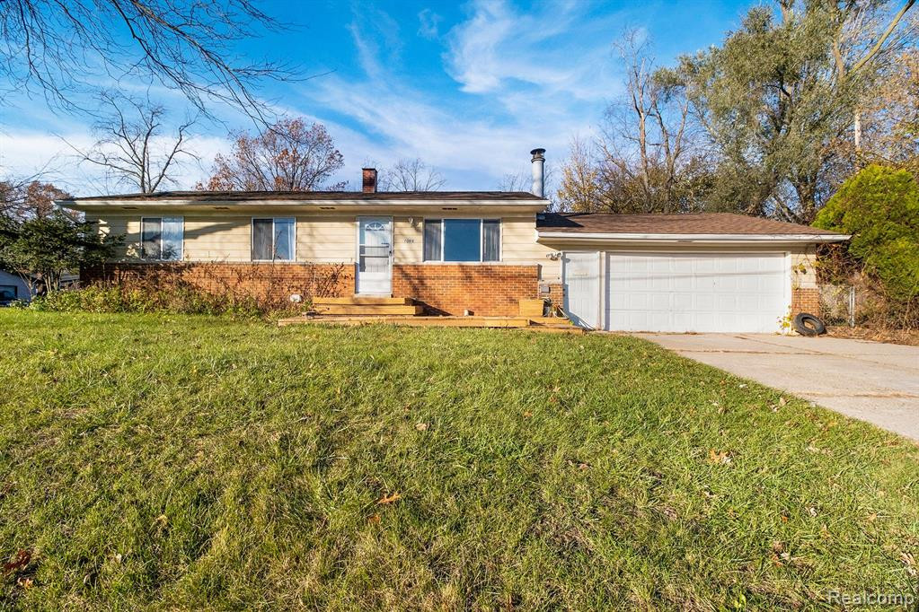 1066 MCCOY Street, Wolverine Lake, MI 48390 — front exterior