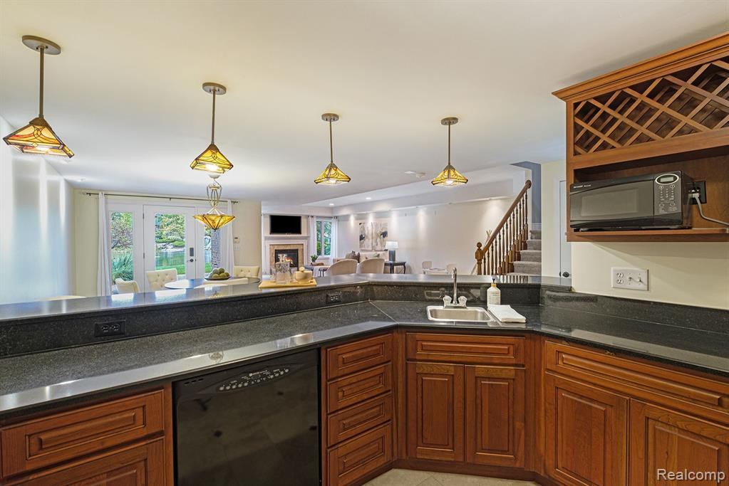 10769 WATERFALL Court, South Lyon, MI 48178 — Photo 30
