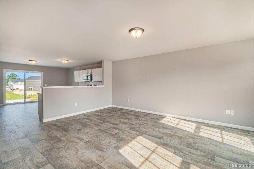 3088 IVY WOOD Circle, Howell, MI 48855 — Photo 4