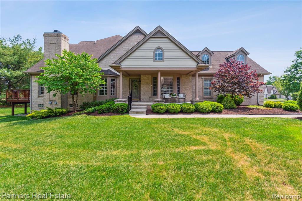 7570 WOODWIND Court, Brighton, MI 48116 — front exterior