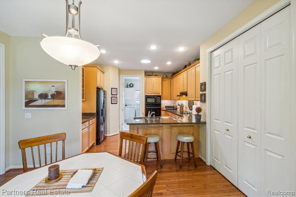 7570 WOODWIND Court, Brighton, MI 48116 — Photo 19