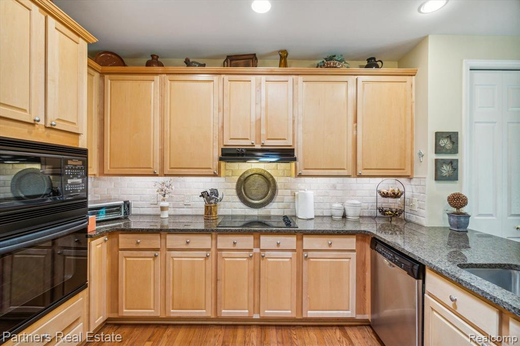 7570 WOODWIND Court, Brighton, MI 48116 — Photo 21