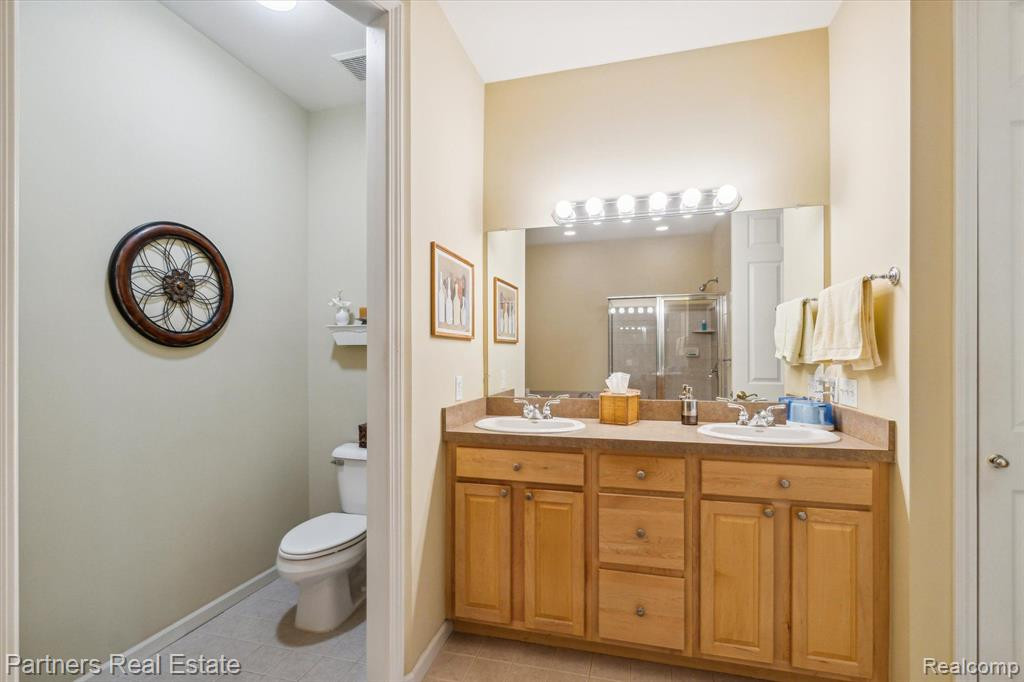 7570 WOODWIND Court, Brighton, MI 48116 — Photo 27