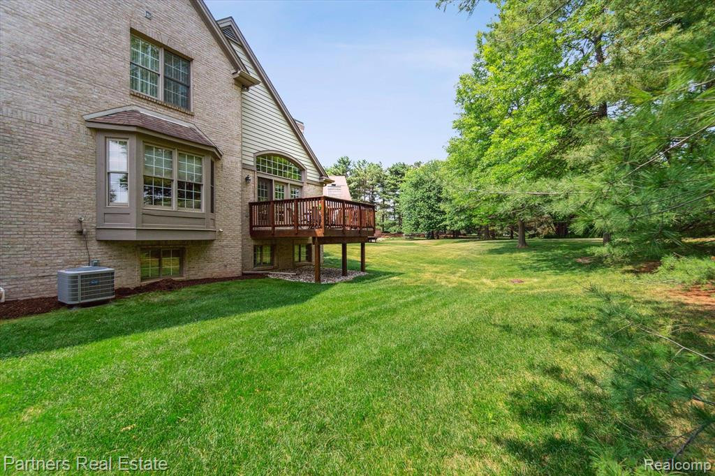 7570 WOODWIND Court, Brighton, MI 48116 — Photo 46