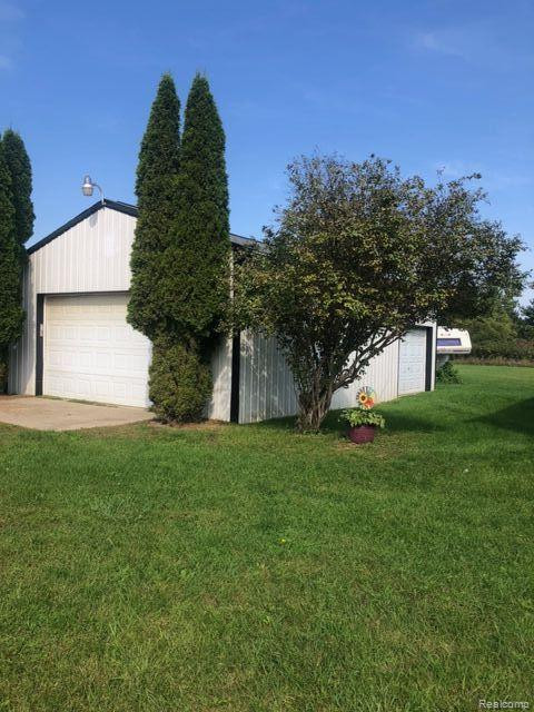 53 E BARNES Road, Fostoria, MI 48435 — Photo 4