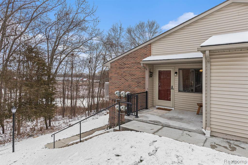 396 SPRING BROOKE Drive, Brighton, MI 48116 — front exterior