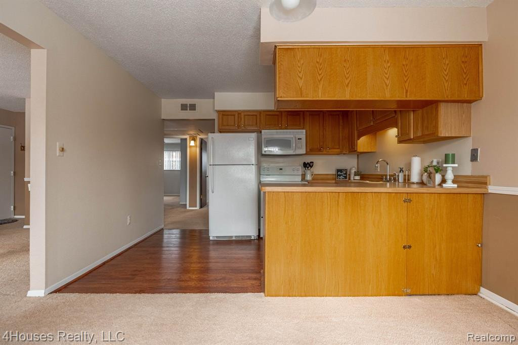 5251 HIGHLAND Road, 114, Waterford, MI 48327 — Photo 20