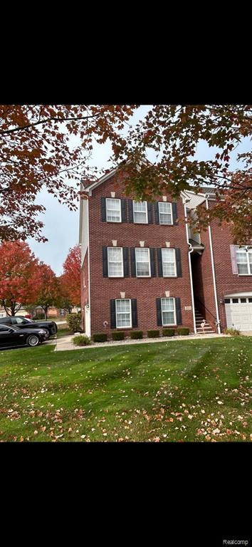 726 CHERRY ORCHARD Road, 161, Canton, MI 48188 — front exterior