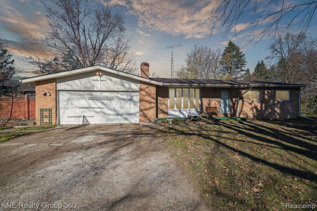 9118 CALKINS Road, Flint, MI 48532 — front exterior