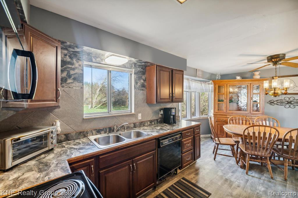 9118 CALKINS Road, Flint, MI 48532 — Photo 21