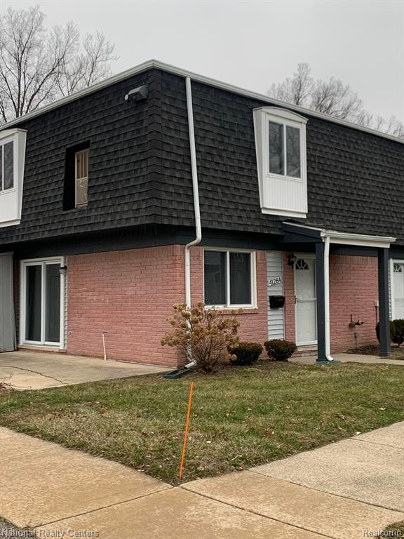 41284 N WOODBURY GREEN Drive, Belleville, MI 48111 — front exterior