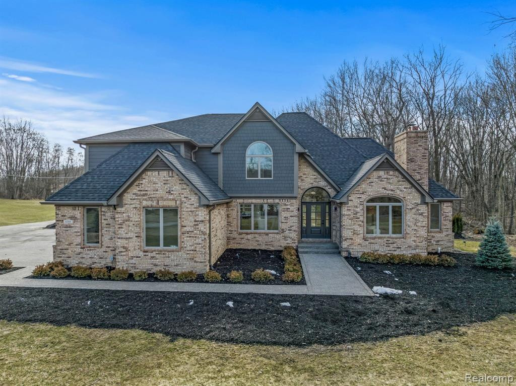 6166 7 MILE Road, South Lyon, MI 48178 — front exterior