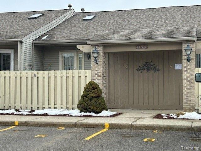 61740 Williamsburg Drive, South Lyon, MI 48178 — front exterior