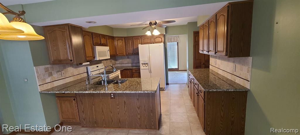 11156 Hammerstone Drive, South Lyon, MI 48178 — Photo 4