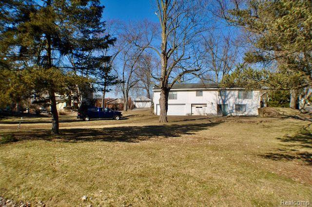 1642 MCCOY Street, Wolverine Lake, MI 48390 — front exterior