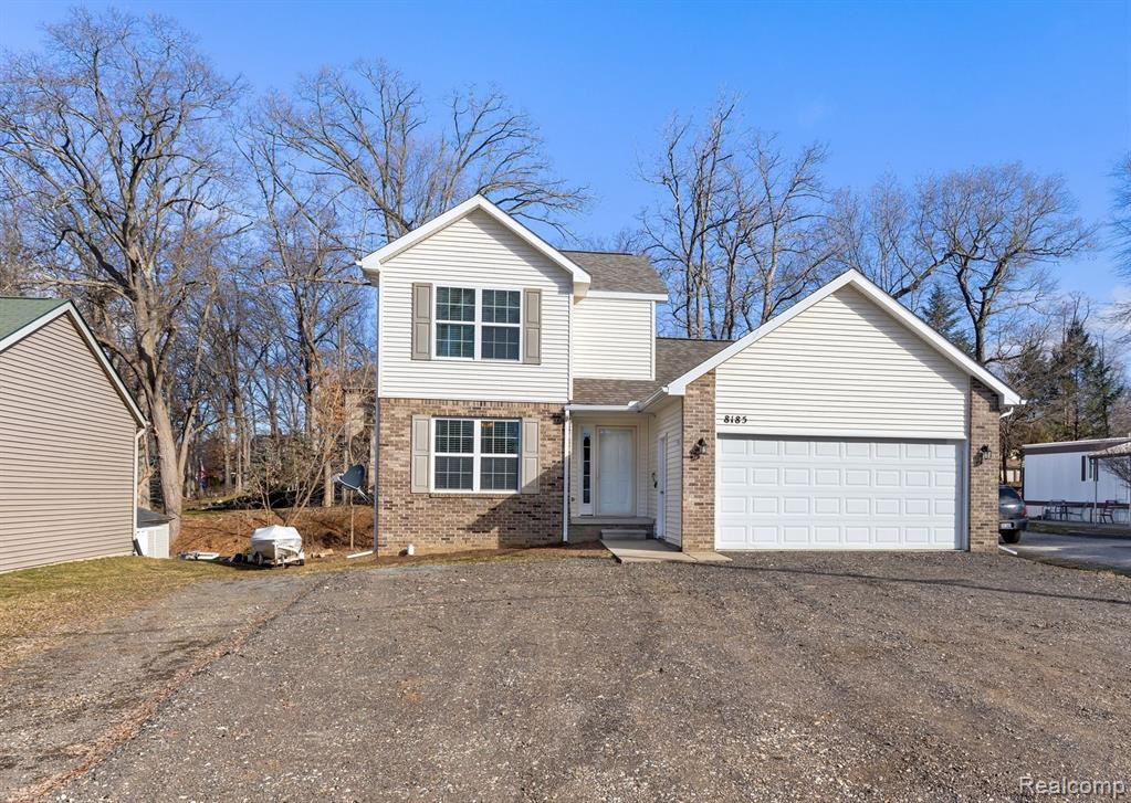 8185 DONNA LOU Drive, Brighton, MI 48114 — front exterior