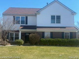 13905 MILTON Drive, Belleville, MI 48111 — front exterior