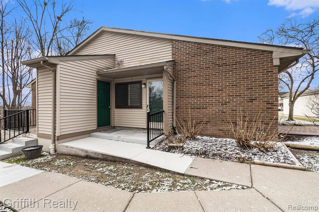 406 SPRING BROOKE Drive, Brighton, MI 48116 — front exterior