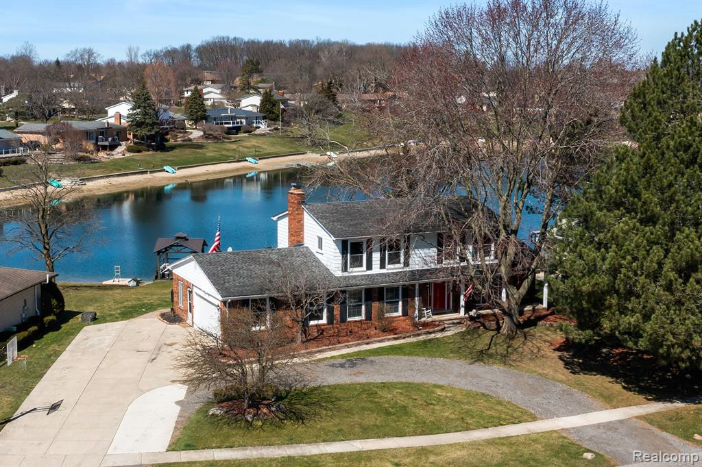 53285 Woodbridge Drive, Shelby Twp, MI 48316 — front exterior