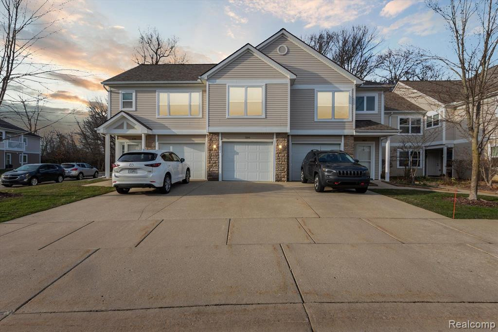 566 FIELDSTONE Circle N, Chelsea, MI 48118 — front exterior