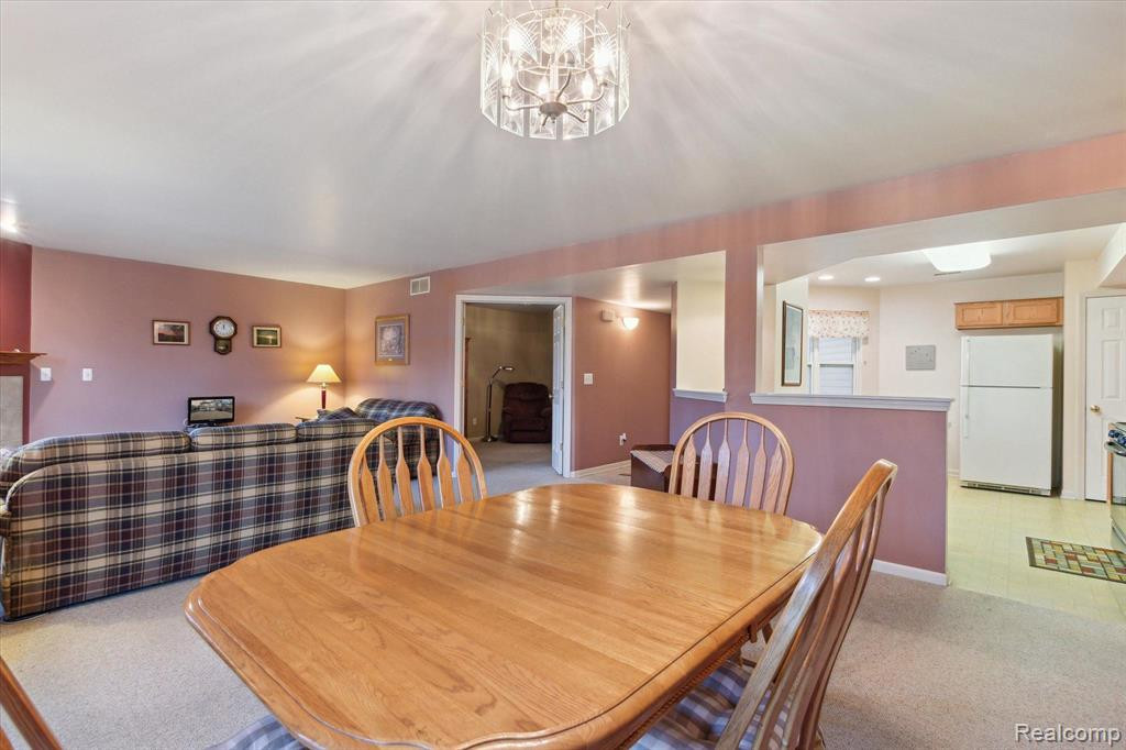 566 FIELDSTONE Circle N, Chelsea, MI 48118 — Photo 12