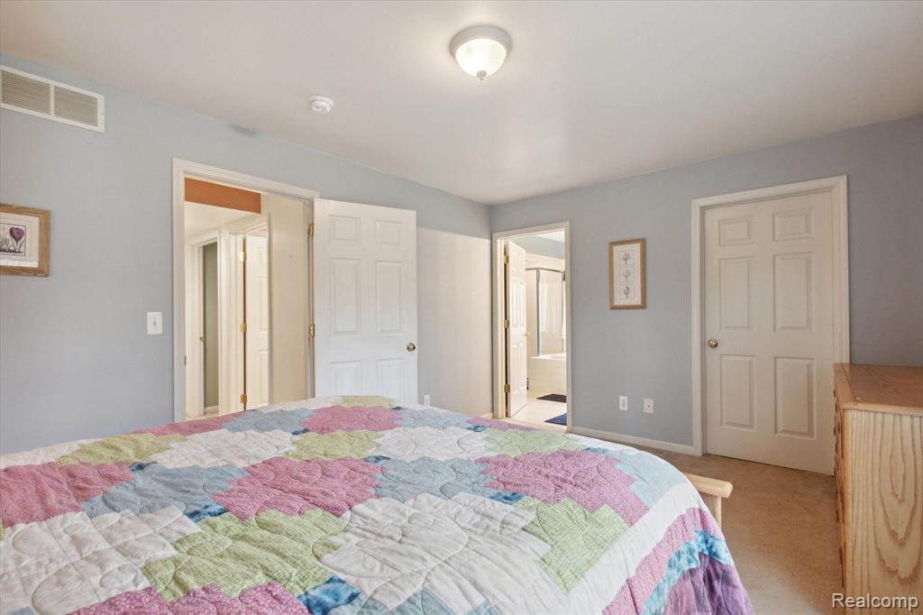 566 FIELDSTONE Circle N, Chelsea, MI 48118 — Photo 21