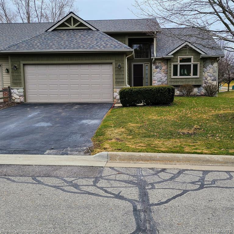 700 HEATHERIDGE Court, Brighton, MI 48116 — front exterior