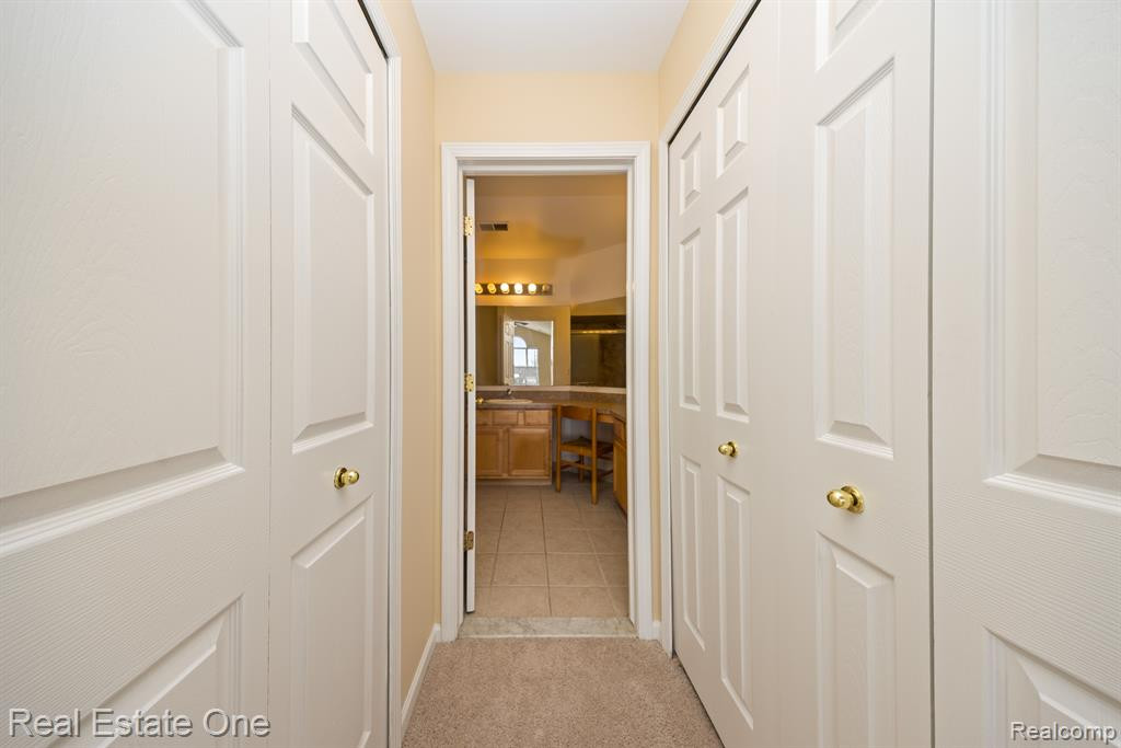 10202 JASMINE Drive, 52, Walled Lake, MI 48390 — Photo 12