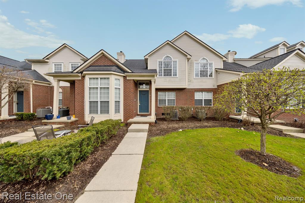 10202 JASMINE Drive, 52, Walled Lake, MI 48390 — front exterior