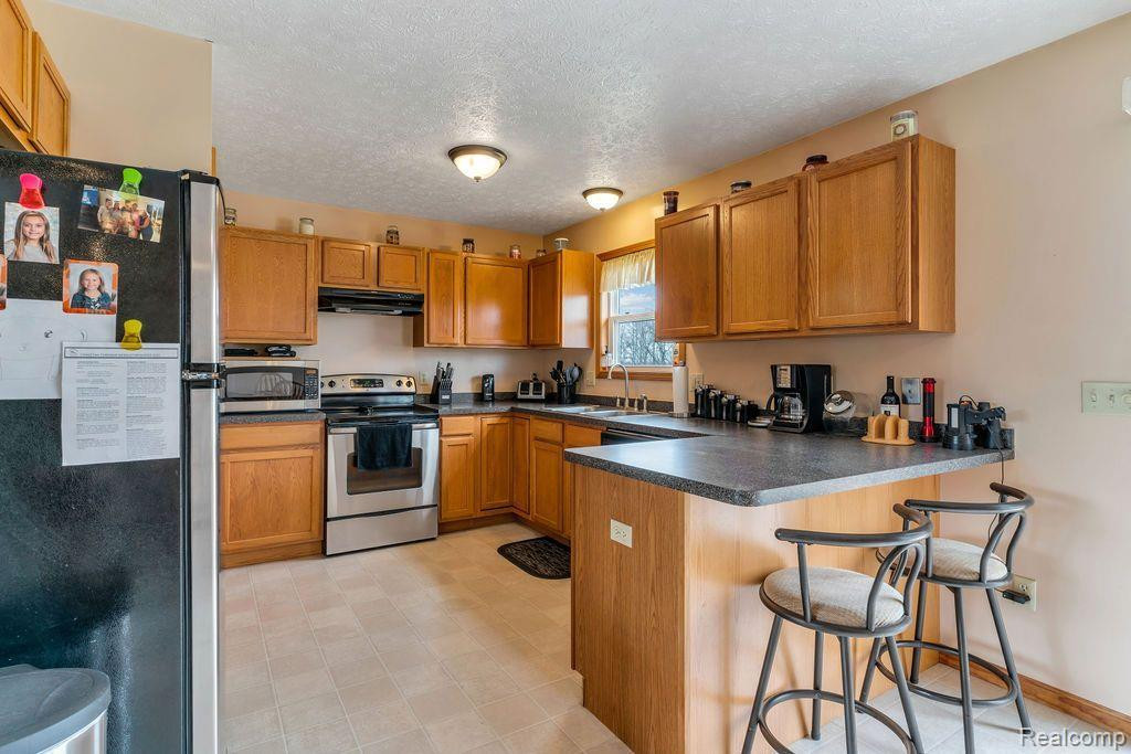 5814 HAYNER Road, Fowlerville, MI 48836 — Photo 11