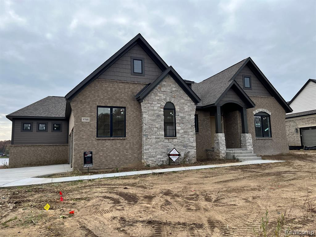 9768 Lake Edge Drive, Brighton, MI 48114 — front exterior