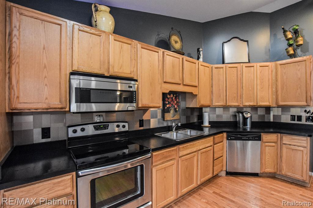 4067 ENGLAND BEACH Road, White Lake, MI 48383 — Photo 20