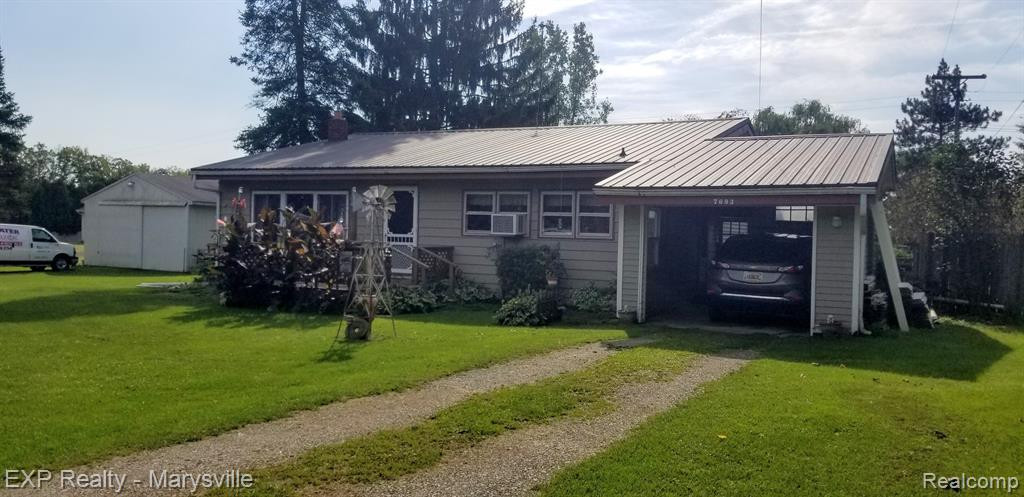 7693 SPARLING Road, Wales, MI — front exterior