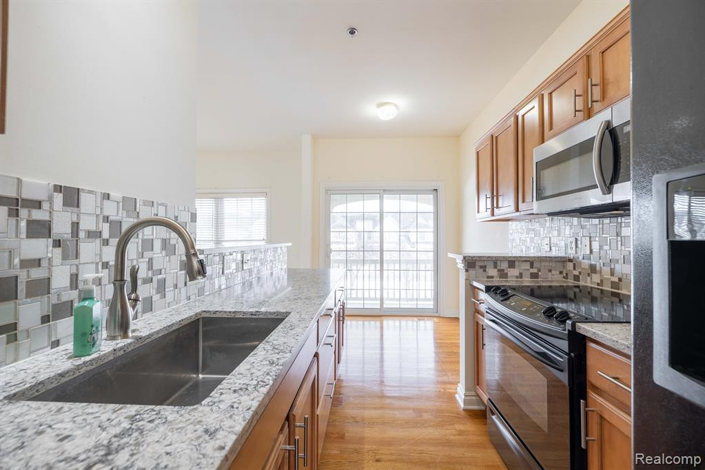 1557 COMMODORE Circle, Canton, MI 48187 — Photo 11